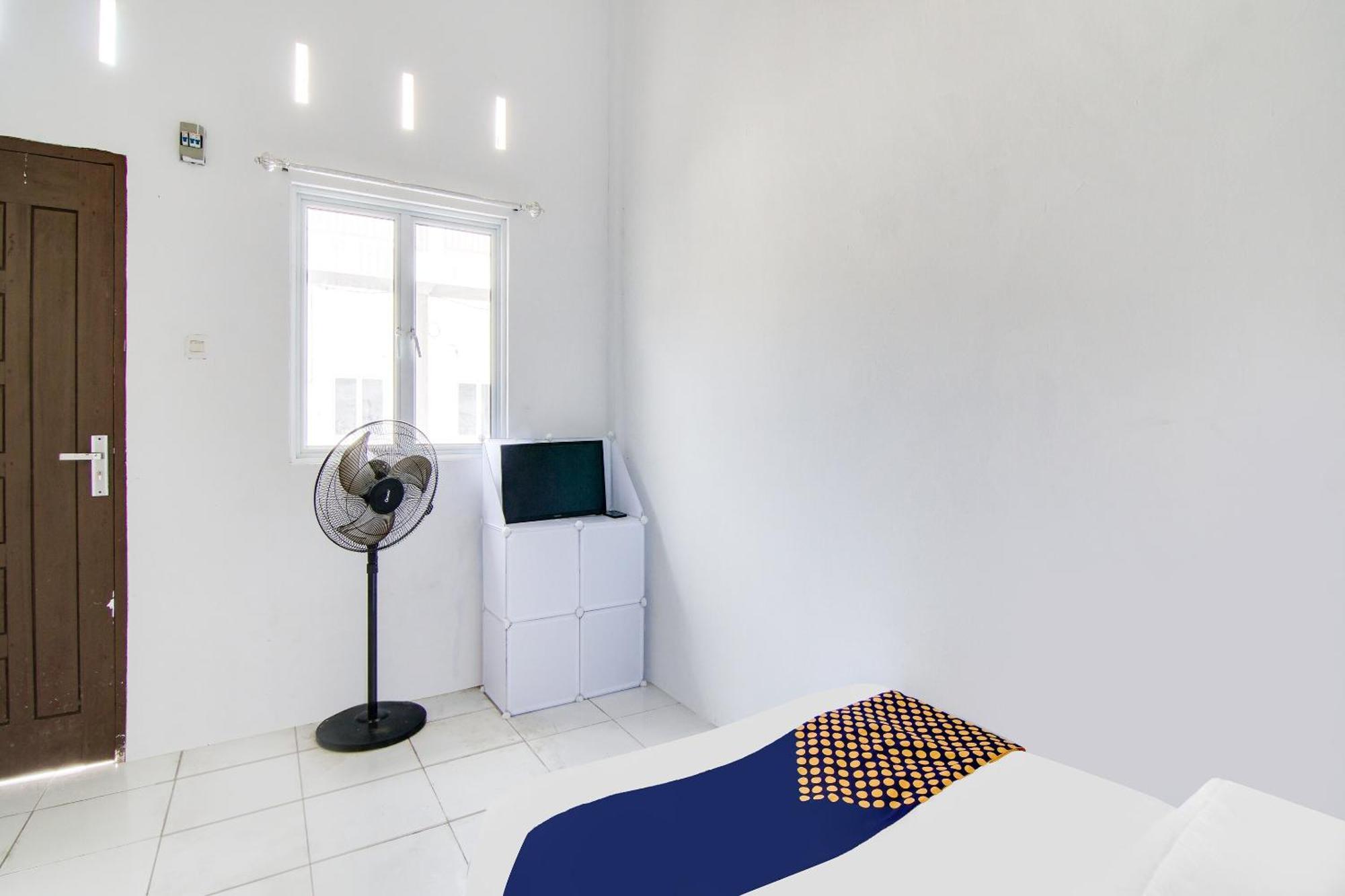 Spot On 91858 Raja Homestay Syariah Pekanbaru Exterior photo